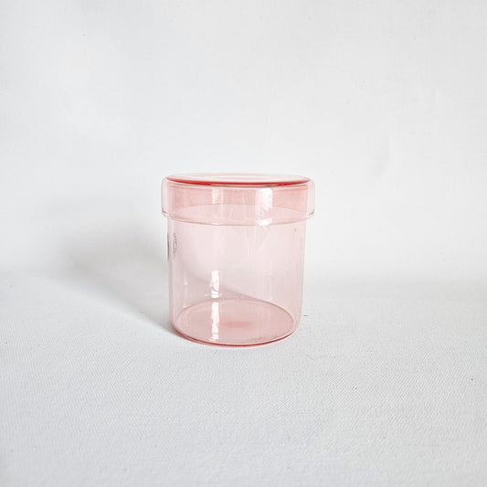 contenant en verre rose