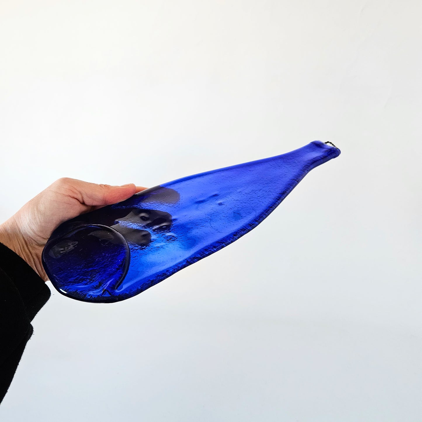 bouteille bleue murale